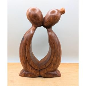 Kissing couple wood carving W. Rendah Bali art minimalist organic flowing